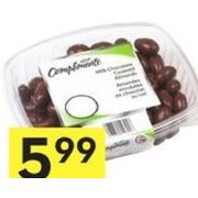 Compliments Chocolate Almonds, Peanuts, Raisins or Yogurt Covered Pretzels - $5.99